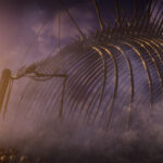 Attack on Titan 3 gameplay — a scout soaring toward a Titan