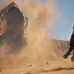 Dune Awakening sandworm erupting from the sands of Arrakis in front of players