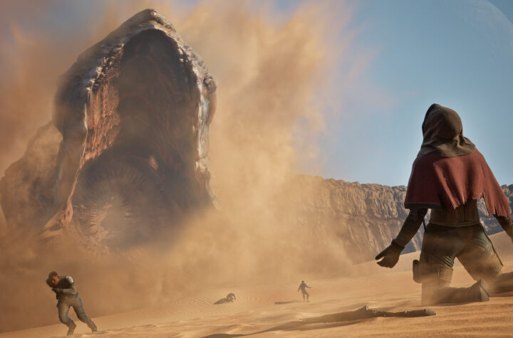 Dune Awakening sandworm erupting from the sands of Arrakis in front of players