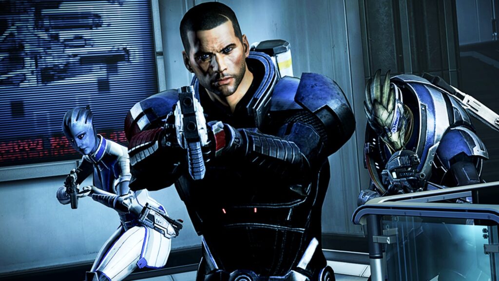Mass Effect key art — Commander Shepard aiming a pistol with Liara T'Soni and Garrus Vakarian