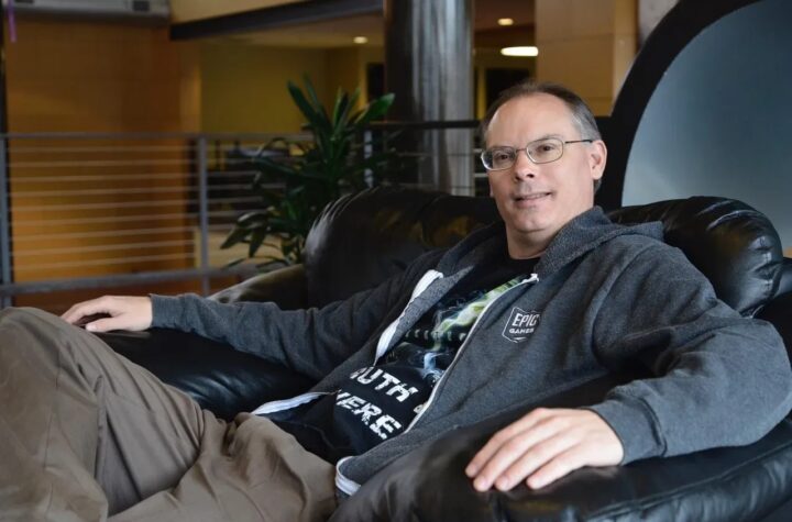 Epic Games CEO Tim Sweeney seated, wearing an Epic Games hoodie